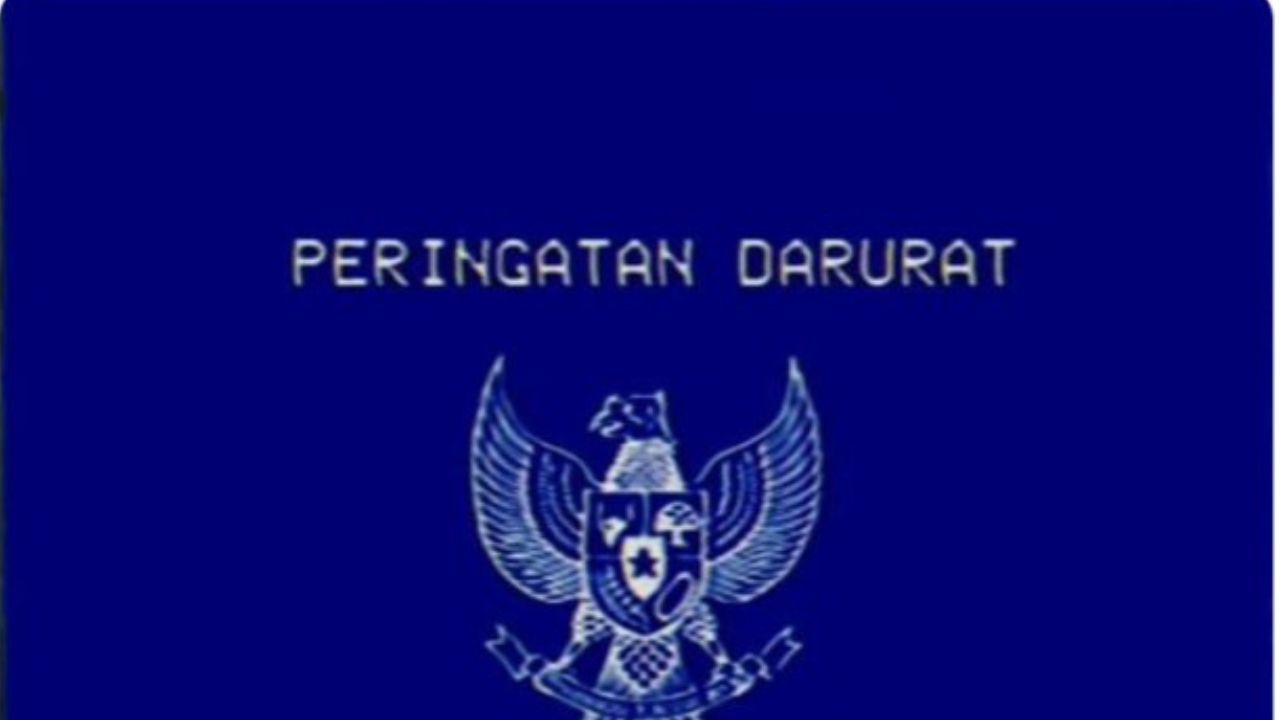 Garuda biru dengan tulisan "Peringatan Darurat."